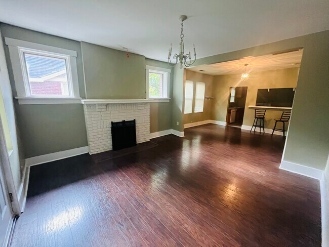 Living room with surround sound speakers on the wall ready for use - 3636 Carnes Ave