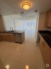 Building Photo - 10275 Collins Ave