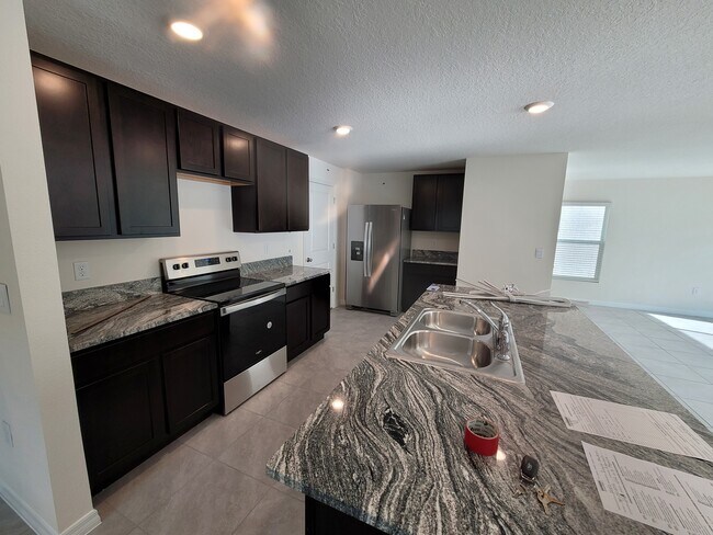 Building Photo - 12112 Lily Magnolia Ln