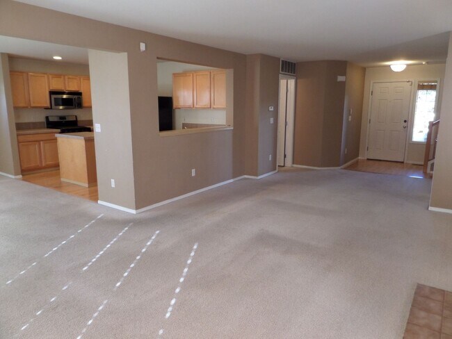 Building Photo - GREAT NEW PRICE! Lovely 4-Bedroom Home in ...