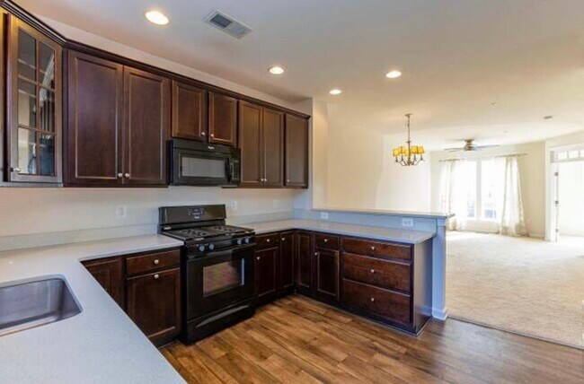 Building Photo - 7440 Riding Meadow Way