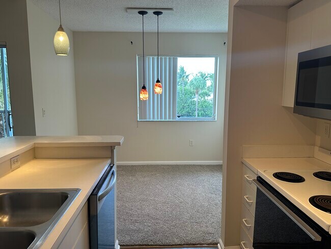 Kitchen - new microwave and dishwasher - 266 Village Blvd