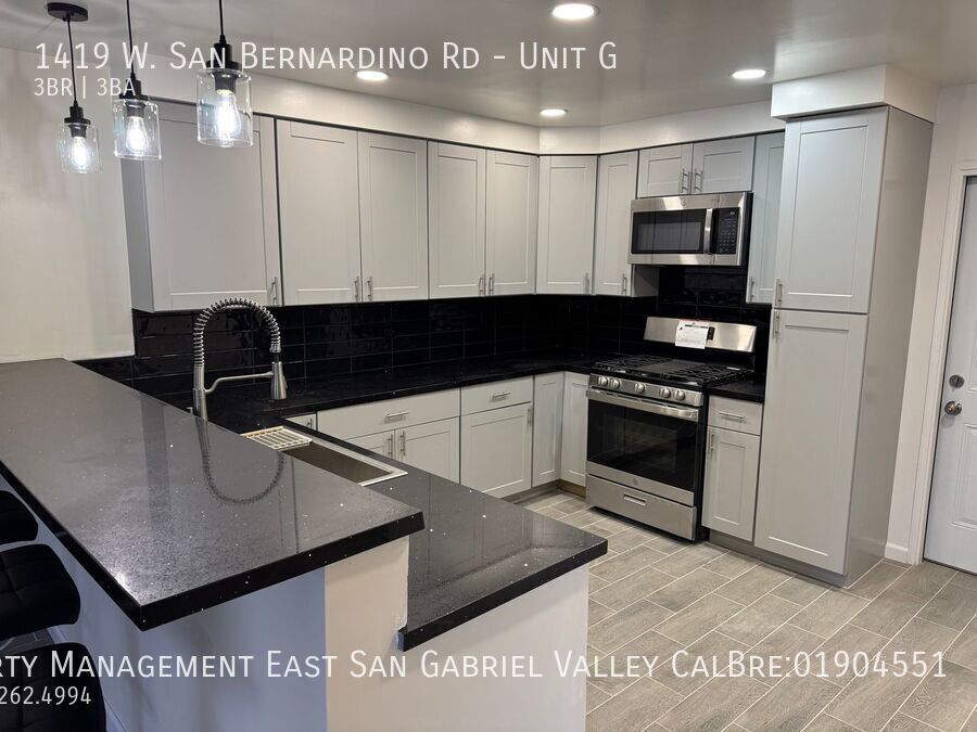 Primary Photo - STUNNING REMODELED THREE BEDROOM CONDO