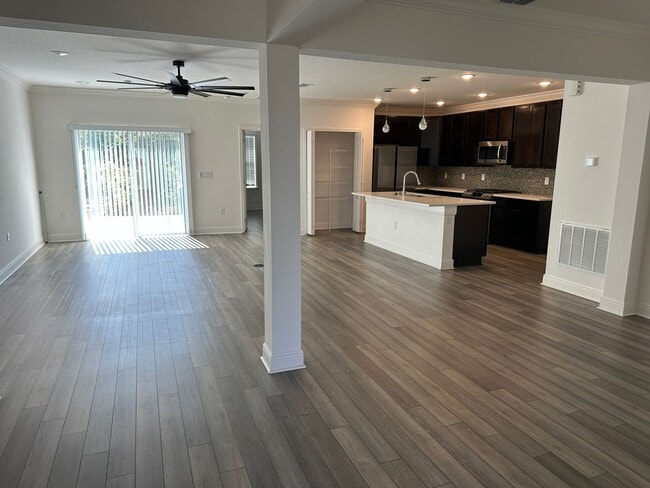 Building Photo - Nearly New 3 Bedroom Smart Home with Lawn Care Included!