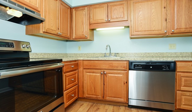 Kitchen features stainless steel appliances and great cabinet and pantry space - Royal Crest Marlboro Apartment Homes