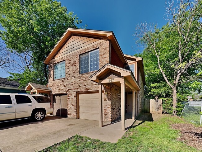 Building Photo - Darling Duplex Coming in April!