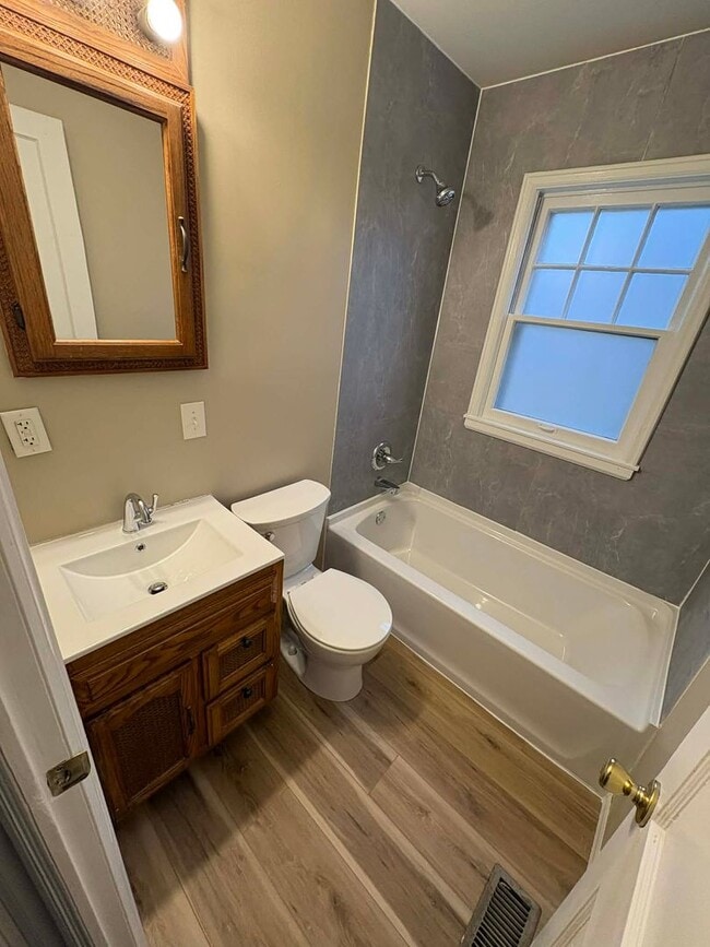 Building Photo - Welcome to Your Next Home with Harvest Investments!