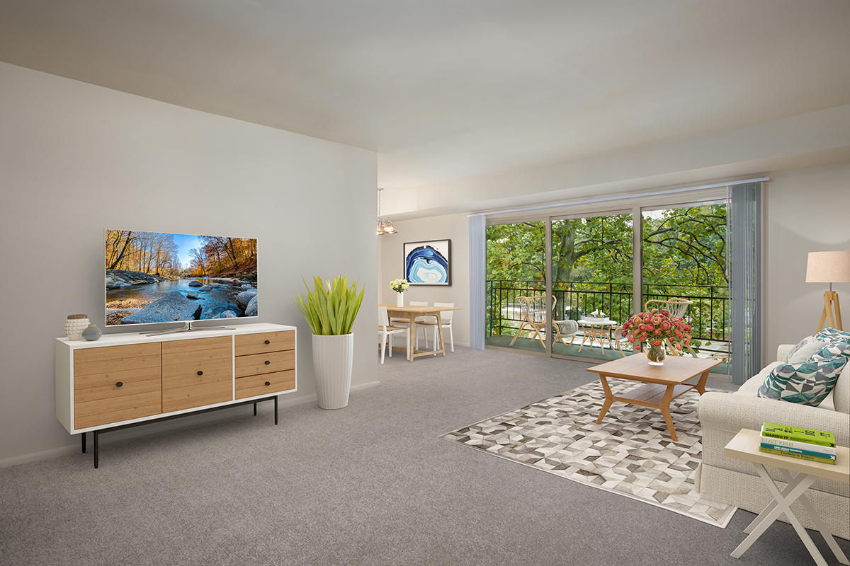 Large covered balcony or patio at Carrollon Manor Apartments in New Carrollton, MD - Carrollon Manor Apartments