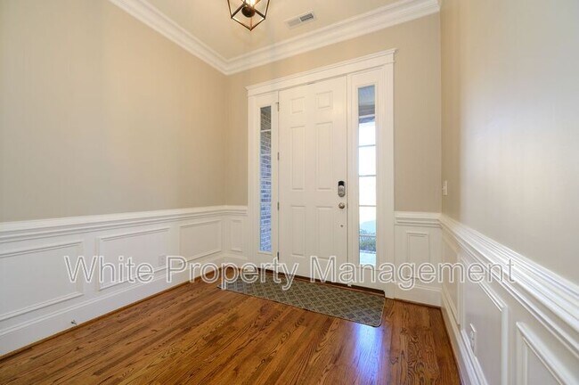 Foto del edificio - 6821 Fairway Row Ln