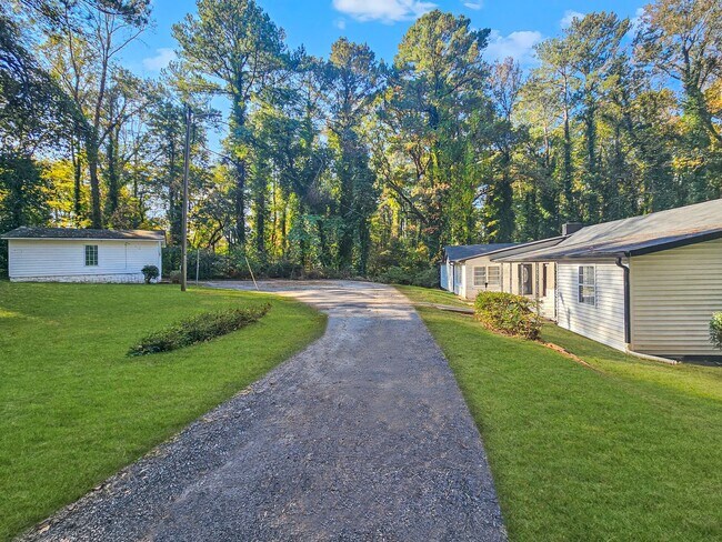 Building Photo - Charming 4-Bedroom, 3-Bath Ranch on Spacious Lot in Prime Atlanta Location