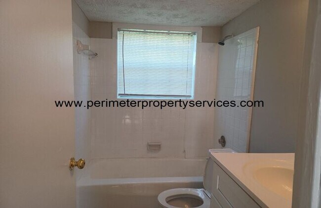 Building Photo - Come See this Amazing Apartment Today!