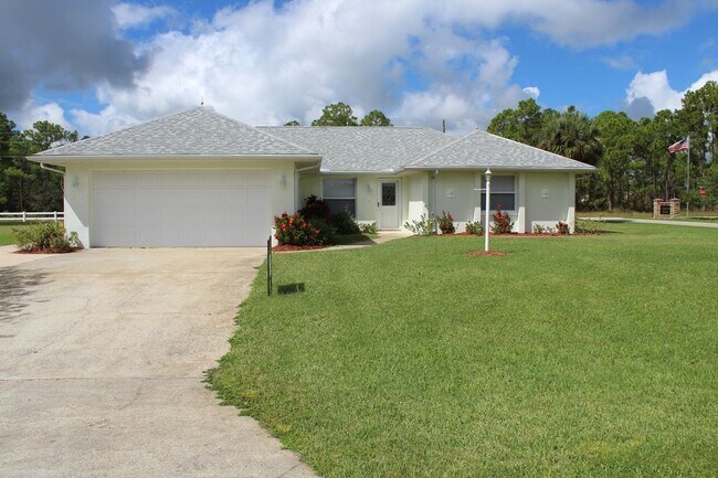 Building Photo - Spacious 2/2/2 Country Walk Home