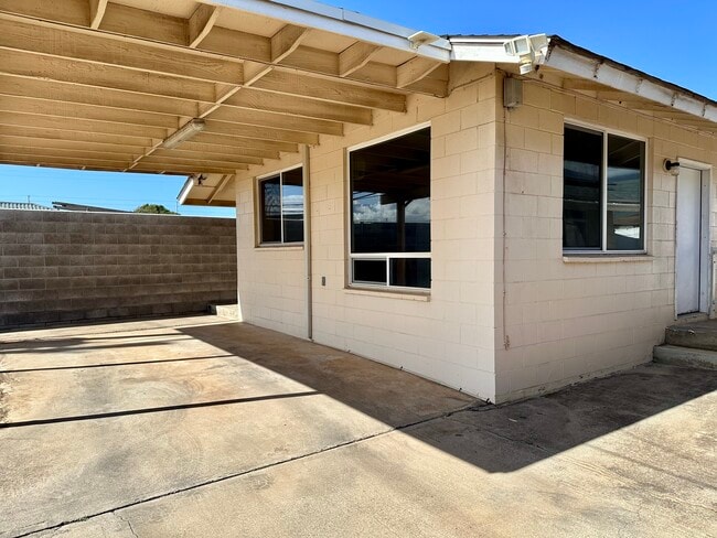 1 car carport, front door - 200 Lono Ave