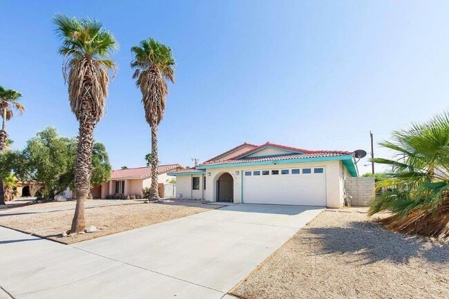 Building Photo - AVAILABLE NOW!! 3 Bedroom/2 Bathroom Cathedral City Pool Home!!  MOVE IN SPECIAL HALF OFF ONE MON...