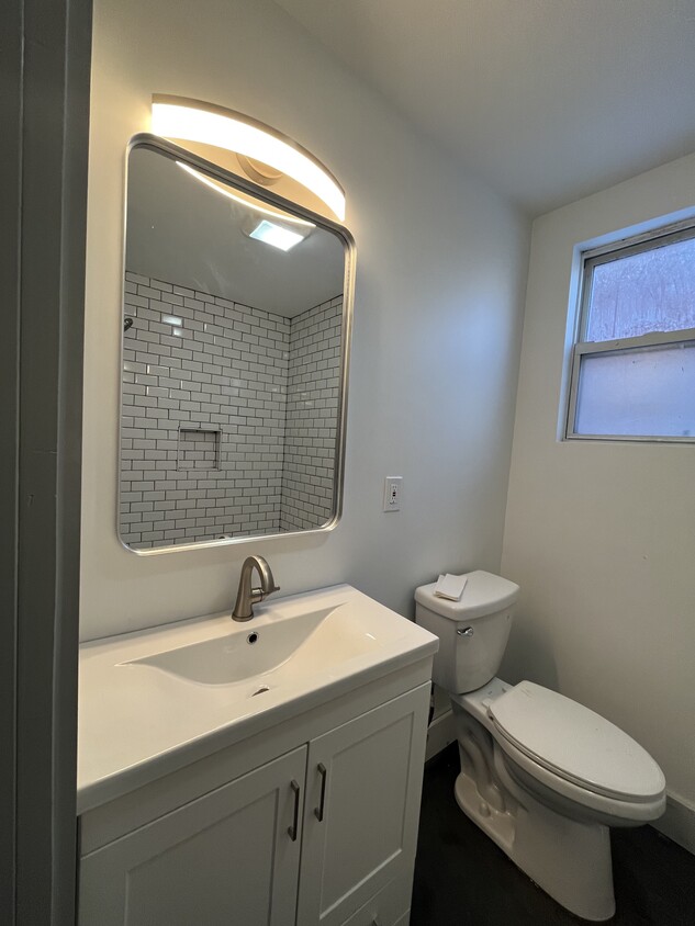 Custom tiled barthroom - 2026 Burnet Ave