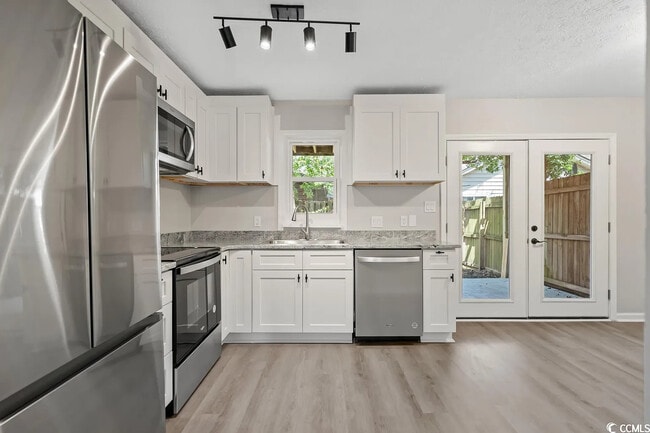 Photo - 708 65th Ave N Townhome