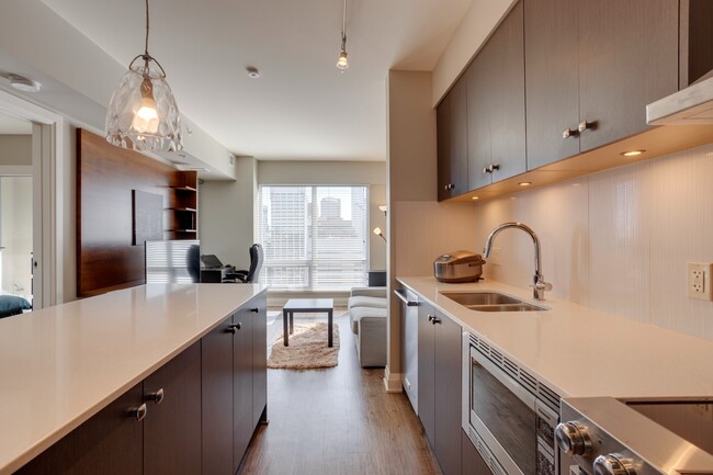 Building Photo - Stylish 1-Bed Condo for Rent on 6th Ave SW...
