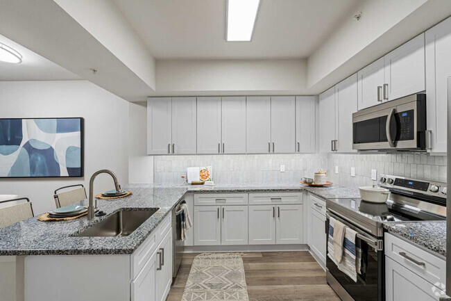 Custom Cabinetry with Undercabinet Lighting, Designer Hardware, and Tile Backsplashes - Cortland Independence