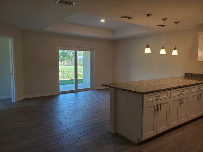 Building Photo - 3x2 Duplex Unit