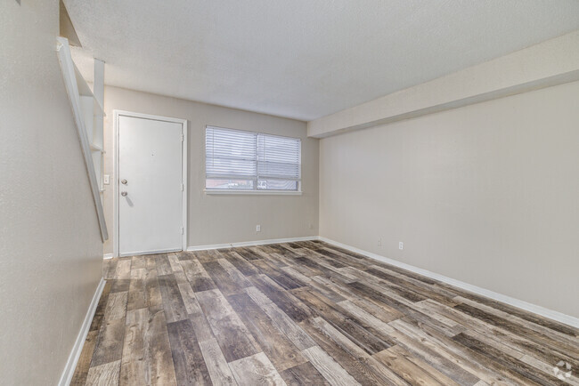 2BR, 1.5BA - 1100SF - Living Area - 23 East Apartments