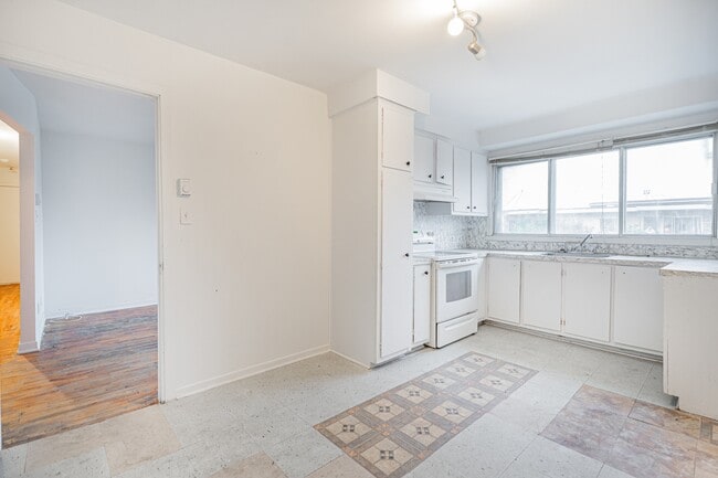 Photo du bâtiment - 6880-625e 25e Ave