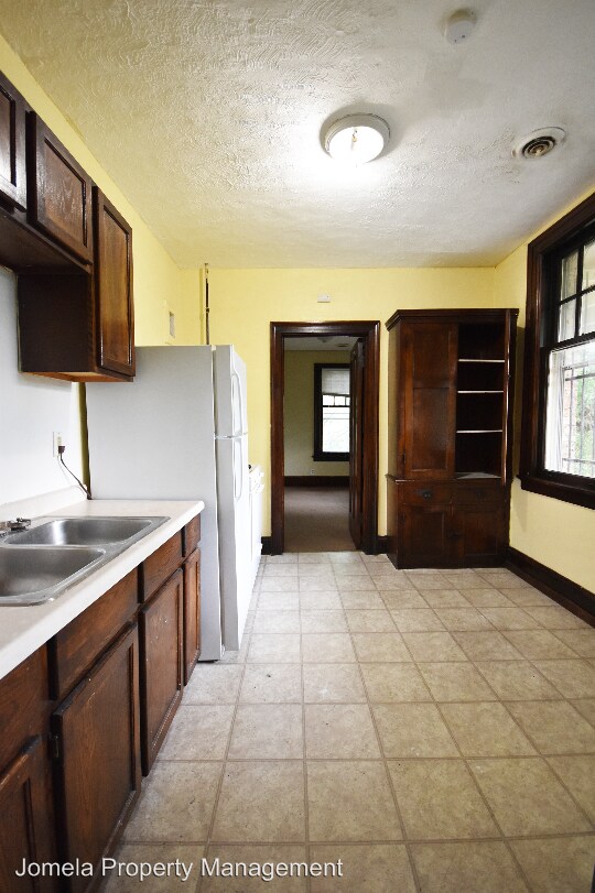 Foto del edificio - 3116 N Downer Ave