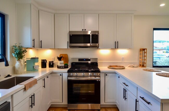 Gas Stove, Microwave, Dishwasher, & Refrigerator - 21025 Barbados Cir