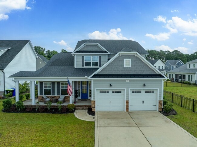 Building Photo - Stunning 4 bedroom 2.5 bath home located in Hampstead Wyndwater Community