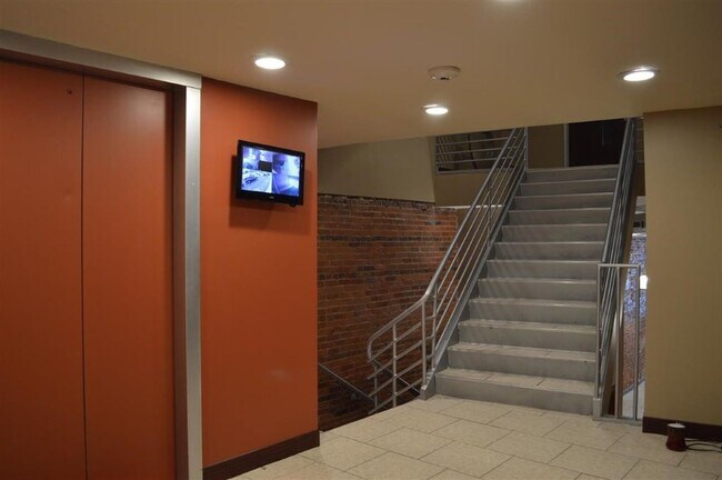 Private stairwell to condo - 323 Main St