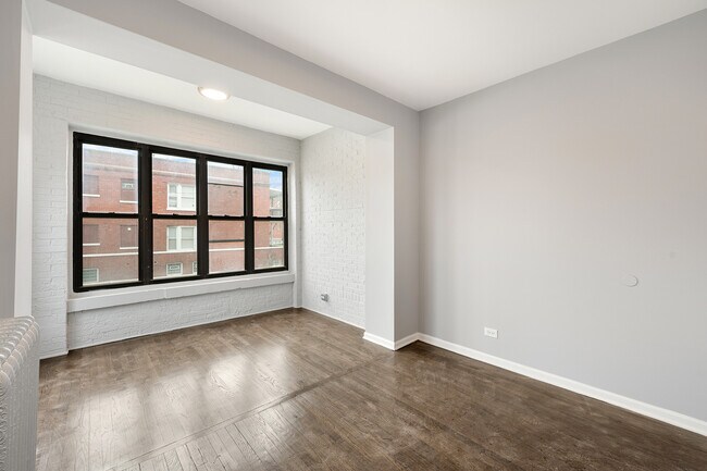 Building Photo - 7654 S Marquette Ave