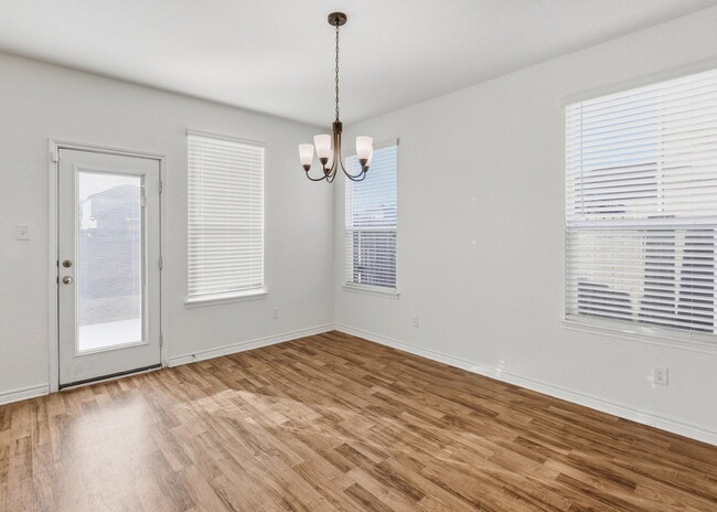 Building Photo - This spacious 4-bed/3-bath two-story rental is a gem waiting for you!