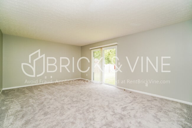 Building Photo - Two-story, pet-friendly home
