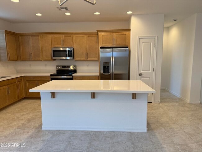 Foto del edificio - 9960 W Mitchell Ave