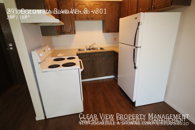 Building Photo - Columbia Manor 2 bedroom condo with utilit...