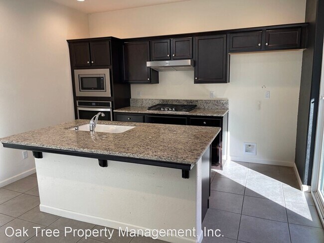 Building Photo - 3 br, 2.5 bath House - 6117 E. Brick Drive