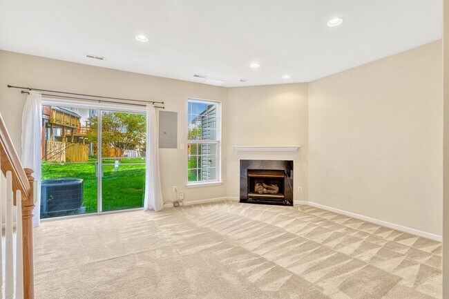 Building Photo - Beautiful End Unit Townhome, close to Rest...