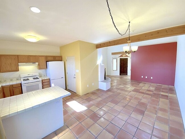 Kitchen and open living room - 3218 La Paz Ln