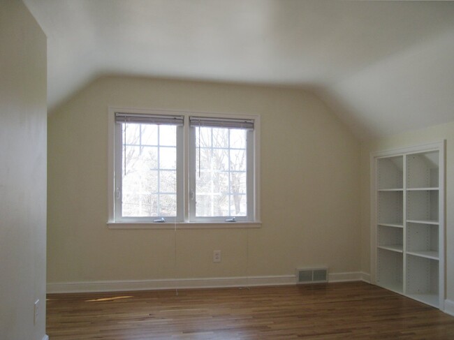 Bedroom with built-in storage and closet (not pictured) - 1511 7th ave nw