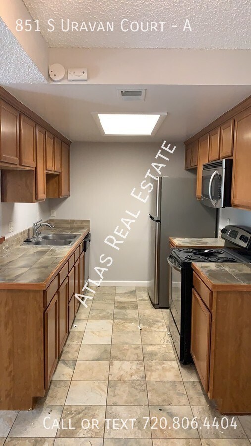 Building Photo - BEAUTIFUL 2 BED CONDO with GARAGE! NEAR BU...