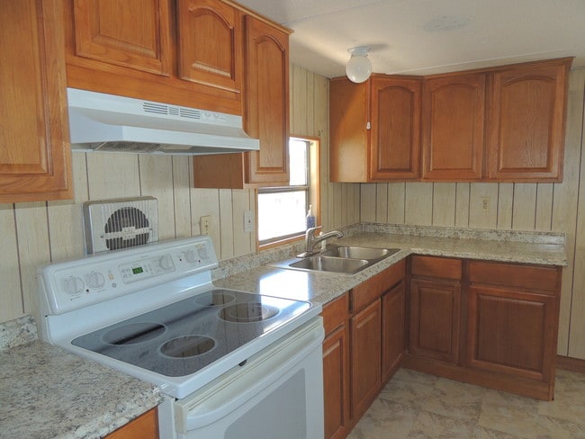 WOOD CABINET & SELF-CLEANING STOVE - 7424 Egress Ln