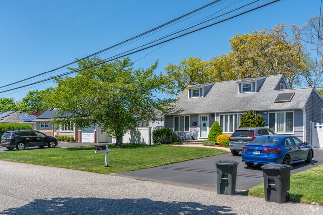 Quaint and cozy Cape Cod style homes line the streets of Holbrook.