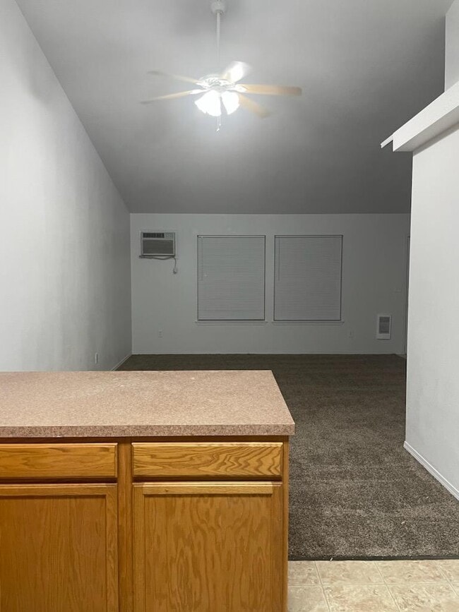 Kitchen looking in to living room - 803 N 20th Ave