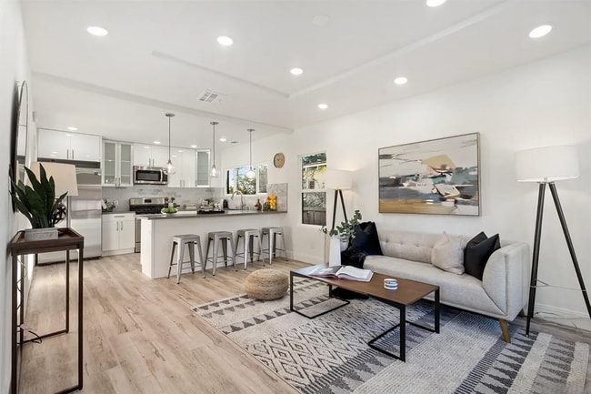 Building Photo - Beautifully Updated Spanish-Style Home Featuring an En Suite Master and Redwood Deck