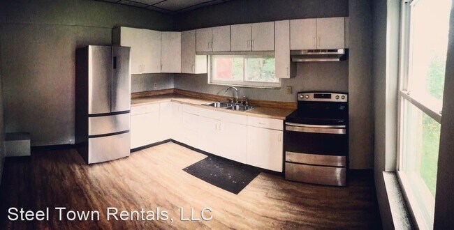 Building Photo - 4 br, 2 bath House - 124 E Jefferson St.