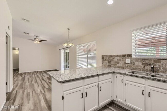 Building Photo - 4 br, 2 bath House - 8009 W Desert Cove Av...