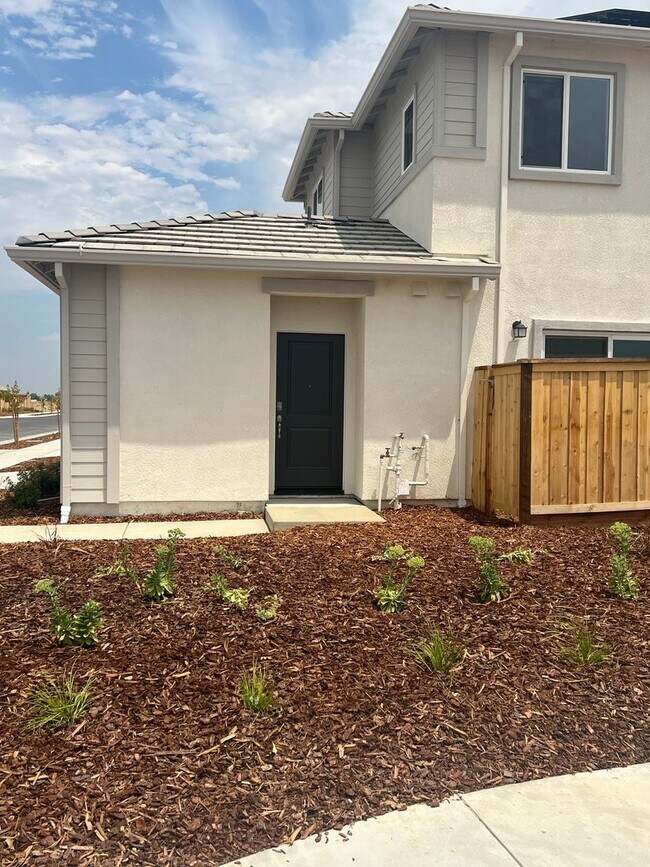 Building Photo - Brand new home with Next-generational living.