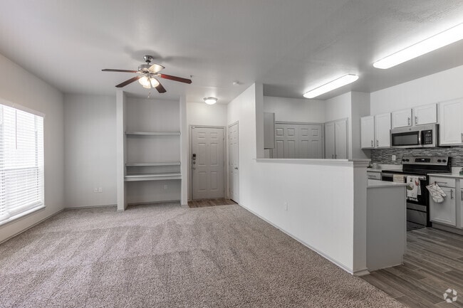 1BR, 1BA - 790SF - A2 - Living Room - Waters Edge Villas