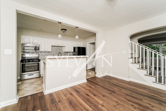 Building Photo - Enjoy living the good life in this 4 bedro...