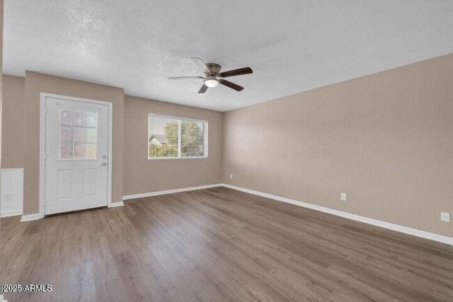 Building Photo - 9639 W Cinnabar Ave