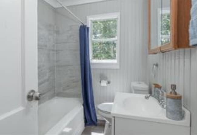 Updated Bathroom with tub and shower - 904 N Virginia St